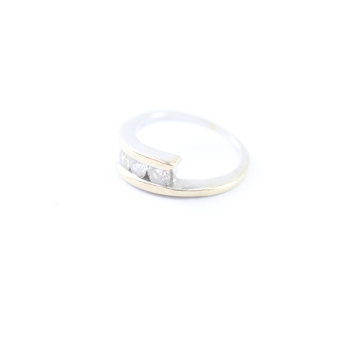 293 - 18ct gold trilogy diamond ring (3.7g) Size K 1/2