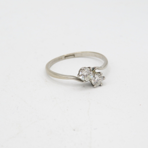 338 - Platinum and diamond cross over ring 2.5g size P
