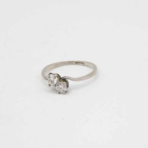 338 - Platinum and diamond cross over ring 2.5g size P