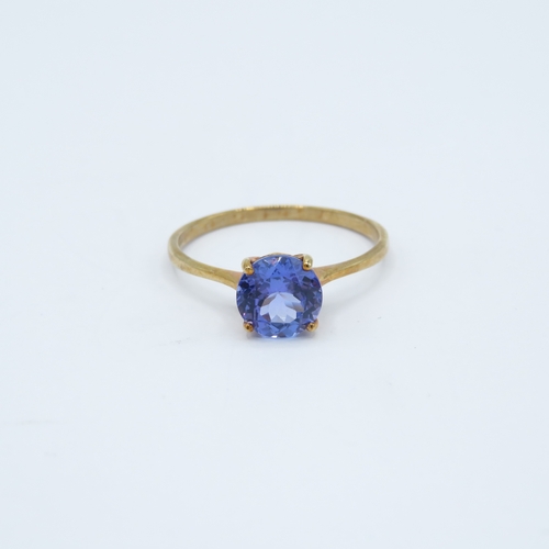 103 - 9ct gold blue gemstone solitaire ring (1.8g) Size V