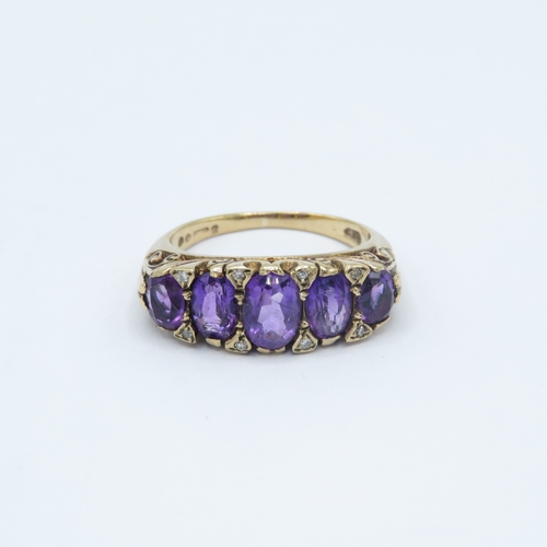 113 - 9ct gold vintage gypsy set amethyst and diamond dress ring (5.3g) Size N