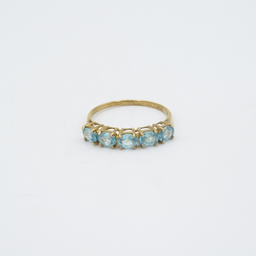 99 - 9ct gold oval cut blue gemstone half eternity ring (2.2g) Size V