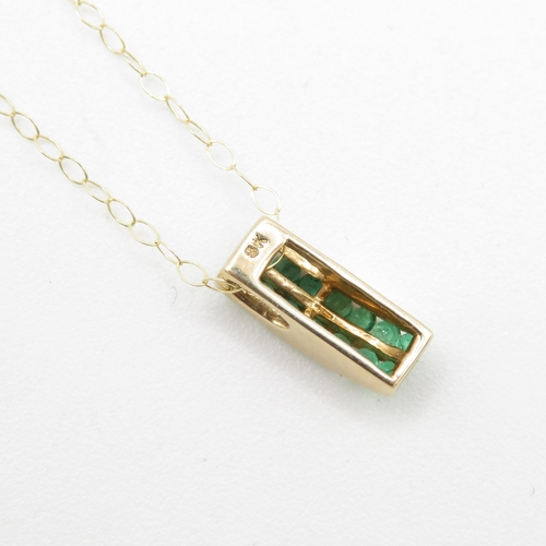 26 - 9ct gold emerald pendant necklace (1.5g)