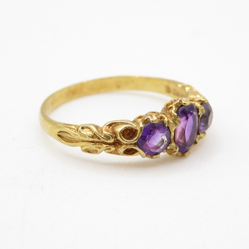 27 - 9ct gold amethyst trilogy patterned ring (2.4g) Size P 1/2