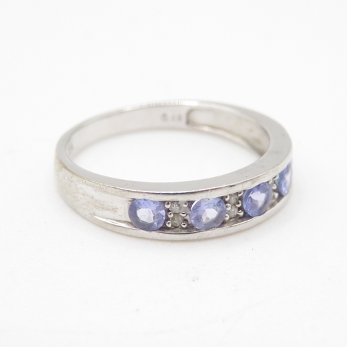 36 - 9ct gold tanzanite & diamond half eternity ring (2.5g) Size P