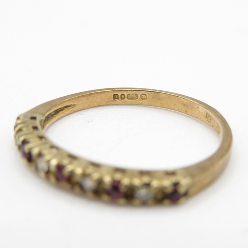 42 - 9ct gold ruby & diamond half eternity ring (1.3g) Size N