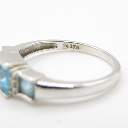 48 - 9ct gold blue topaz & diamond dress ring (2.5g) Size N