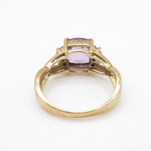 5 - 9ct gold amethyst twist ring (3.5g) Size N