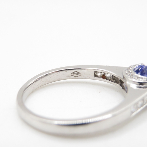 53 - 18ct white gold diamond and tanzanite shoulder setting ring (5.5g) Size R