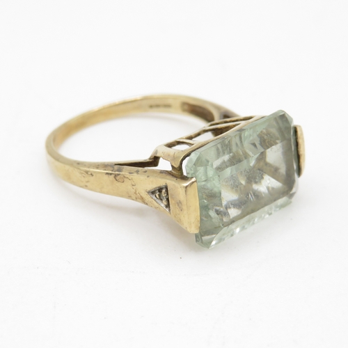 54 - 9ct gold step cut blue gemstone dress ring (4.2g) Size O