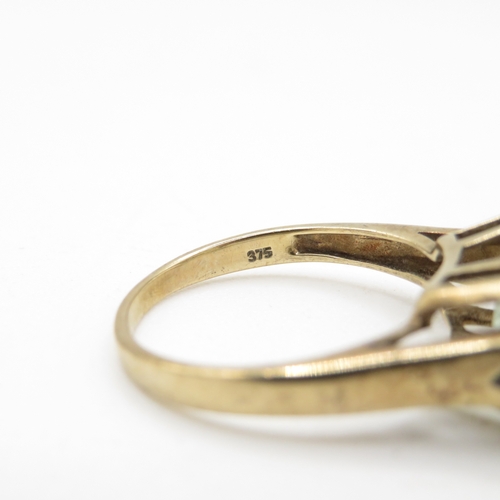 54 - 9ct gold step cut blue gemstone dress ring (4.2g) Size O