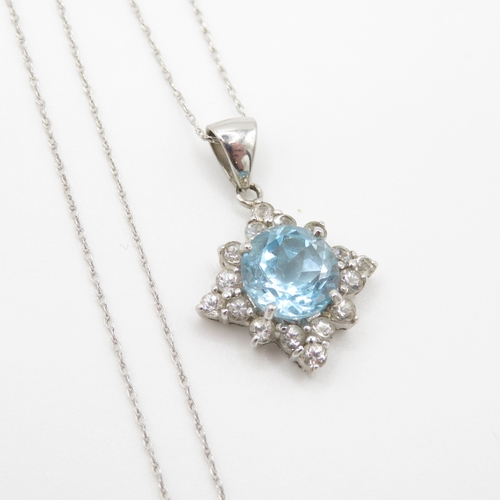 47 - 9ct gold blue topaz & white gemstone cluster pendant necklace (2.7g)