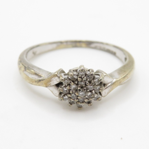 79 - 9ct white gold diamond cluster ring (2.5g) Size N