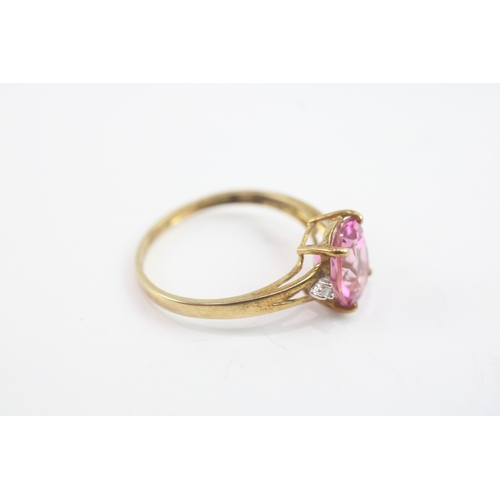 61 - 9ct gold enhanced pink topaz & diamond dress ring (1.9g) Size P