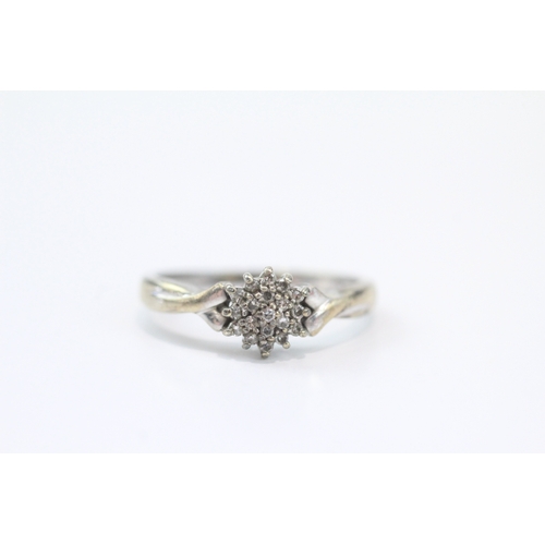 79 - 9ct white gold diamond cluster ring (2.5g) Size N