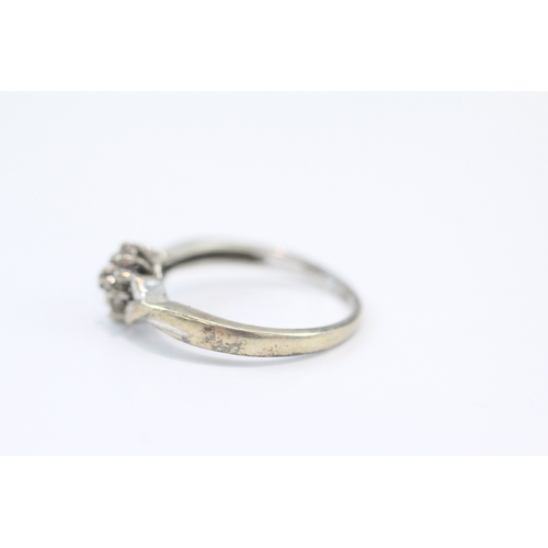 79 - 9ct white gold diamond cluster ring (2.5g) Size N