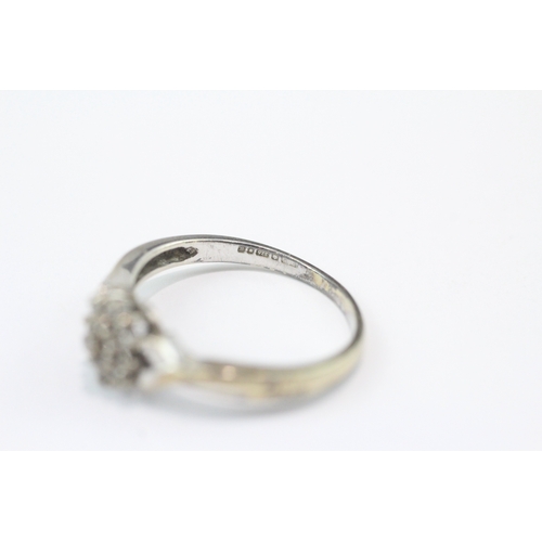 79 - 9ct white gold diamond cluster ring (2.5g) Size N