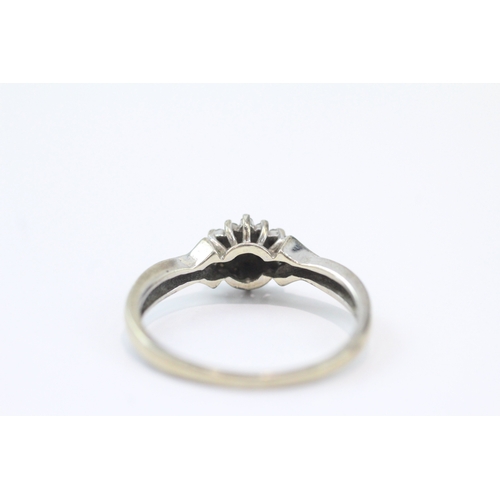 79 - 9ct white gold diamond cluster ring (2.5g) Size N