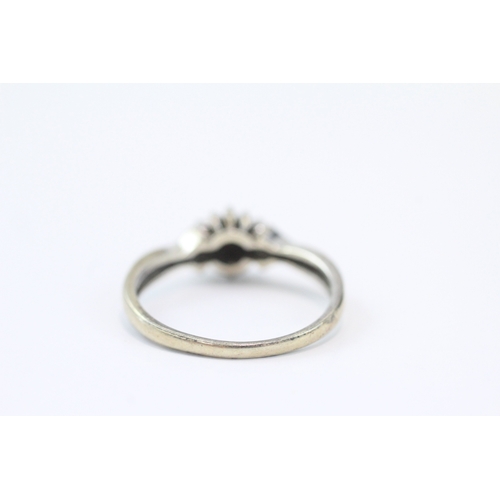 79 - 9ct white gold diamond cluster ring (2.5g) Size N
