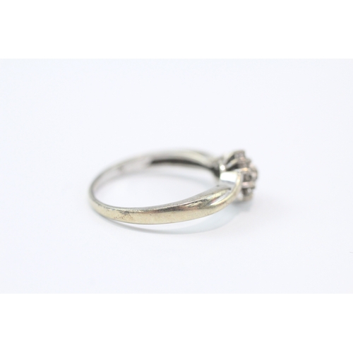 79 - 9ct white gold diamond cluster ring (2.5g) Size N