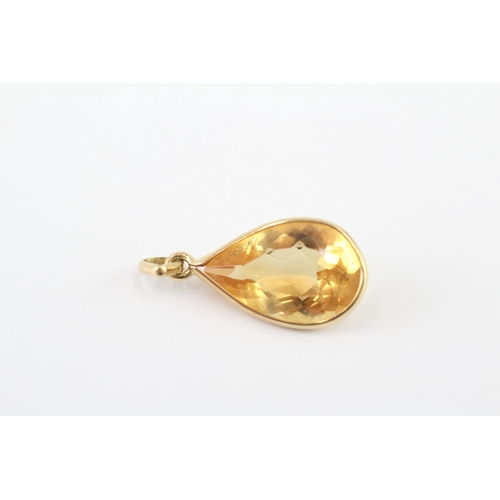 98 - 18ct gold pear cut citrine pendant (1.4g)