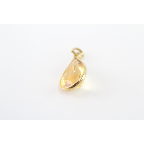 98 - 18ct gold pear cut citrine pendant (1.4g)