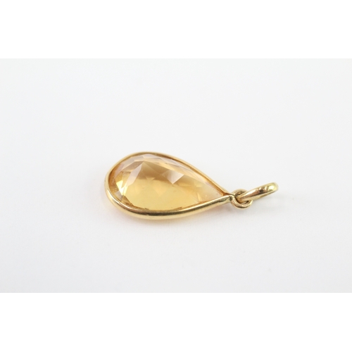 98 - 18ct gold pear cut citrine pendant (1.4g)