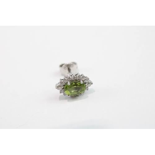 102 - 18ct white gold peridot and diamond stud earrings (3.2g)