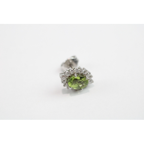 102 - 18ct white gold peridot and diamond stud earrings (3.2g)