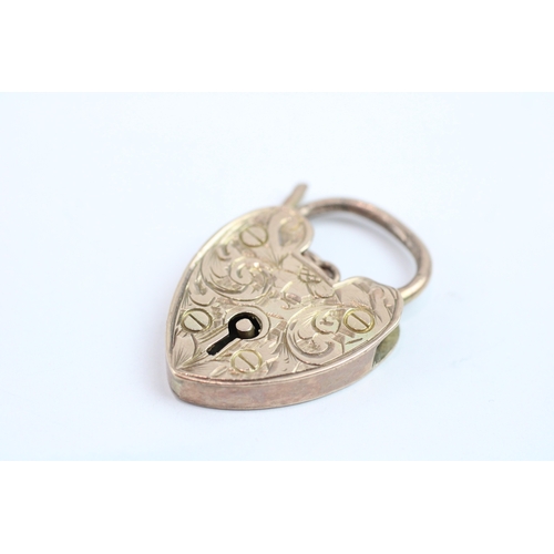 119 - 9ct gold padlock with engraved floral detail (4.2g)