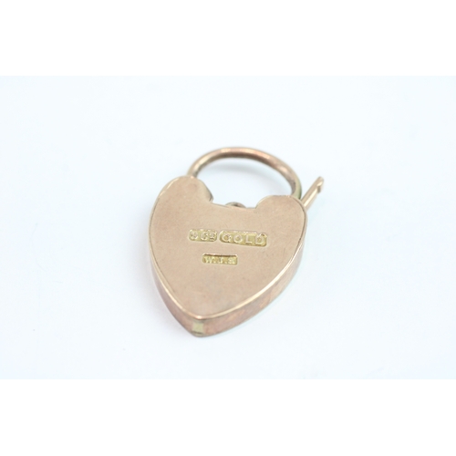 119 - 9ct gold padlock with engraved floral detail (4.2g)