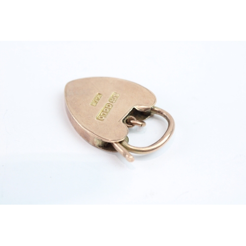 119 - 9ct gold padlock with engraved floral detail (4.2g)