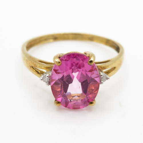 61 - 9ct gold enhanced pink topaz & diamond dress ring (1.9g) Size P