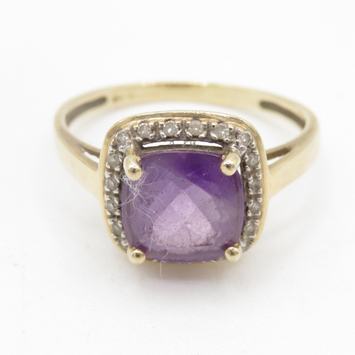 193 - 9ct gold amethyst diamond halo cluster ring (2.7g) Size P