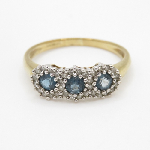 219 - 9ct gold blue topaz & diamond dress ring (2g) Size O