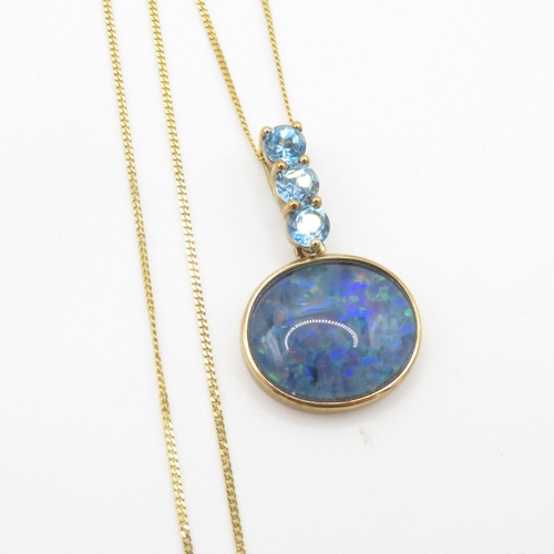 223 - 9ct gold opal triplet & blue topaz pendant necklace (3g)