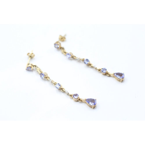 231 - 9ct gold tanzanite and diamond drop earrings (2.6g)