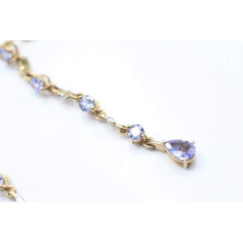 231 - 9ct gold tanzanite and diamond drop earrings (2.6g)