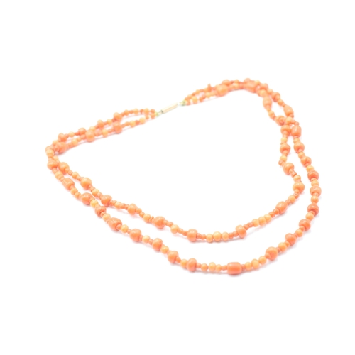238 - 9ct gold coral double strand necklace (17.3g)