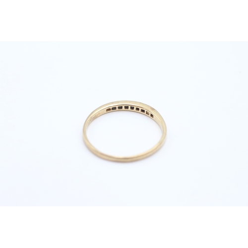24 - 9ct gold channel set diamond ring (1.2g) Size P