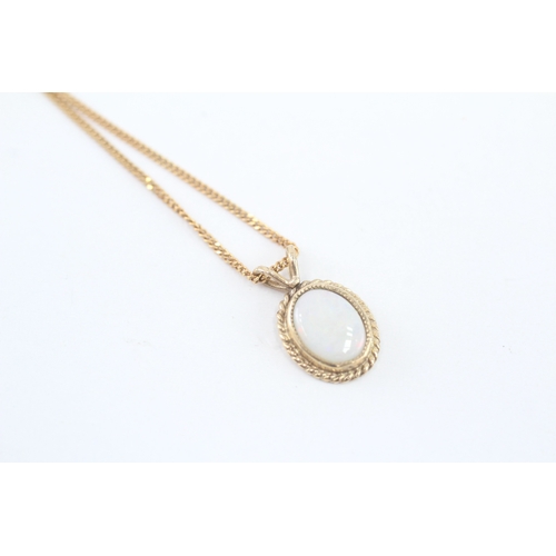 243 - 9ct gold opal pendant necklace (2.4g)