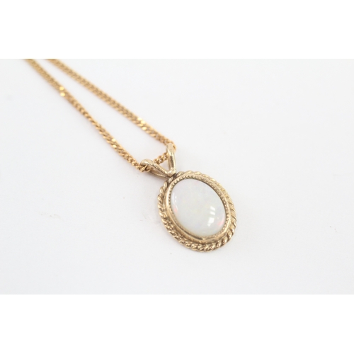 243 - 9ct gold opal pendant necklace (2.4g)