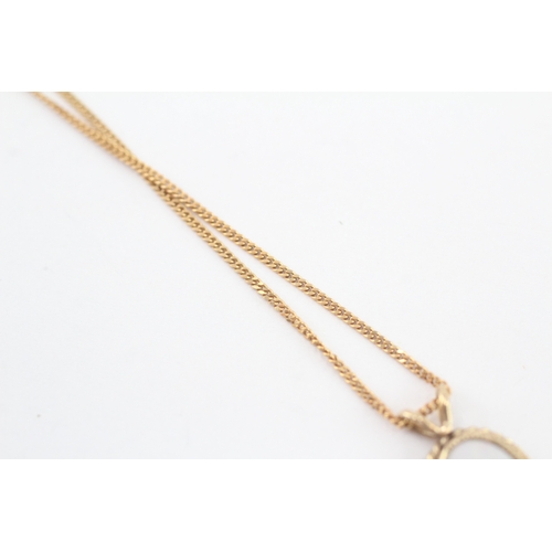 243 - 9ct gold opal pendant necklace (2.4g)