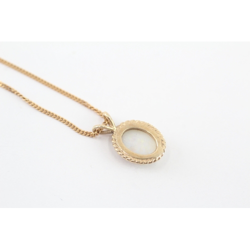 243 - 9ct gold opal pendant necklace (2.4g)