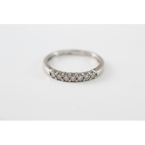 245 - .950 platinum diamond row ring (3g) Size M