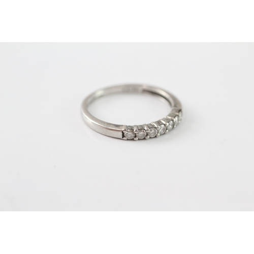 245 - .950 platinum diamond row ring (3g) Size M