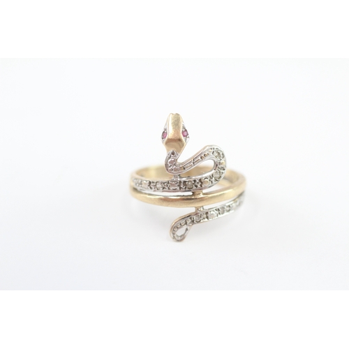 247 - 9ct gold diamond and ruby eyed snake ring (2.6g) Size K 1/2