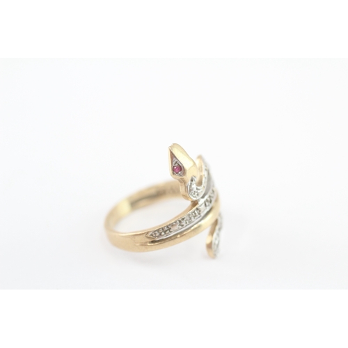 247 - 9ct gold diamond and ruby eyed snake ring (2.6g) Size K 1/2