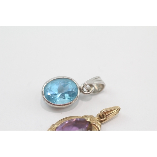 250 - 2x 9ct gold blue topaz & amethyst pendants (3.6g)