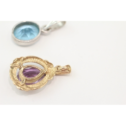 250 - 2x 9ct gold blue topaz & amethyst pendants (3.6g)